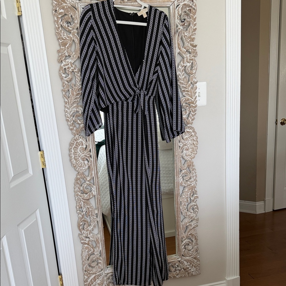 Michael Michael Kors Black and White Striped V-Neck jump suit.